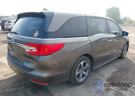 2019 Honda Odyssey Touring z USA, uszkodzony, nr VIN 5FNRL6H83KB103283